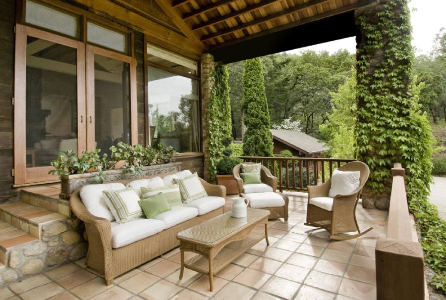 Patio door overlooking green, outdoor sitting area